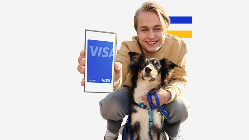 Man and dog showing Visa card on his phone