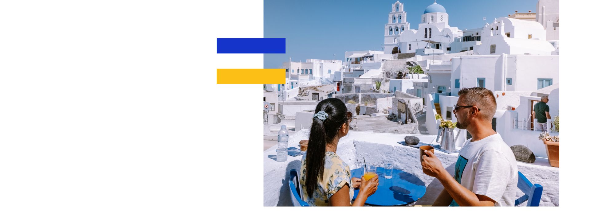 couple on rooftop bar in greece